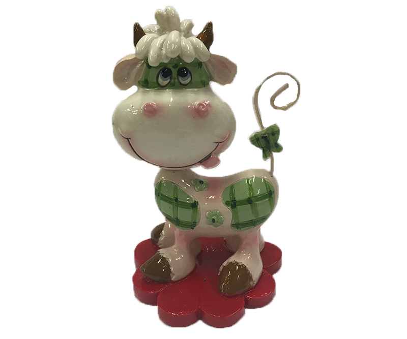 Pyntefigur - Et pink får, der står på en rød blomst